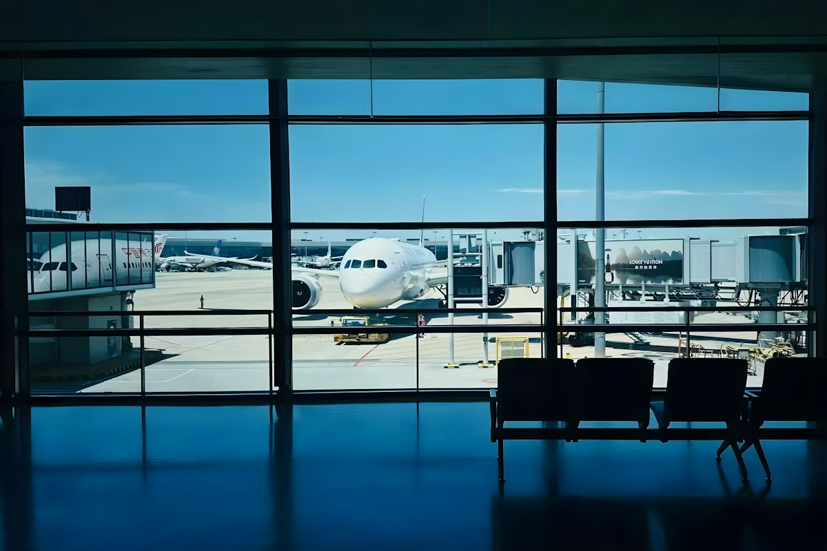 Airplane at the gate seen from a Chicago airport terminal window